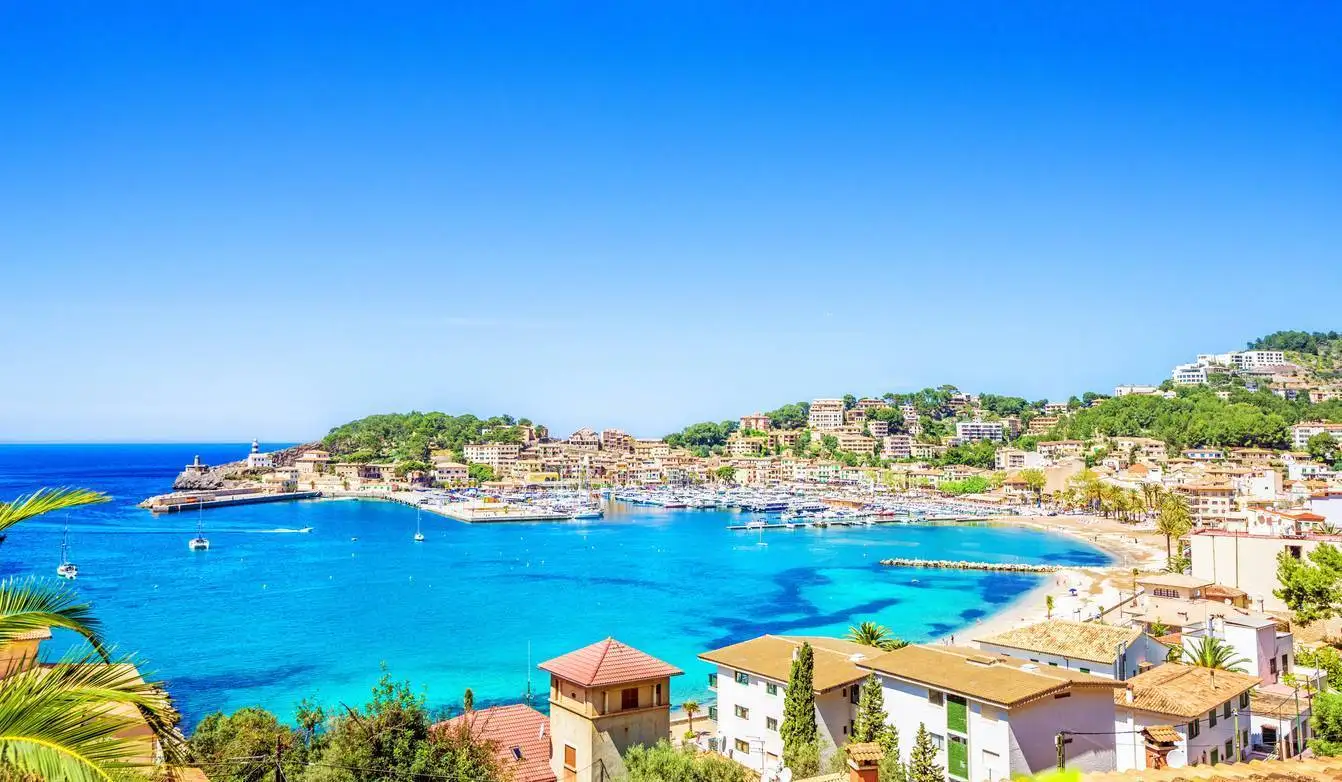 A view of a beach and town in spain.