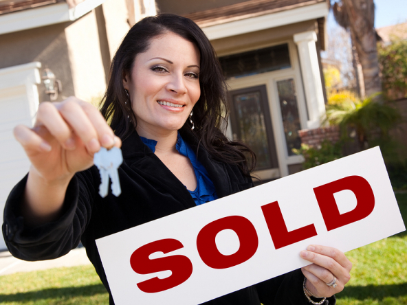 bigstock Hispanic Woman Holding Keys An 6798807