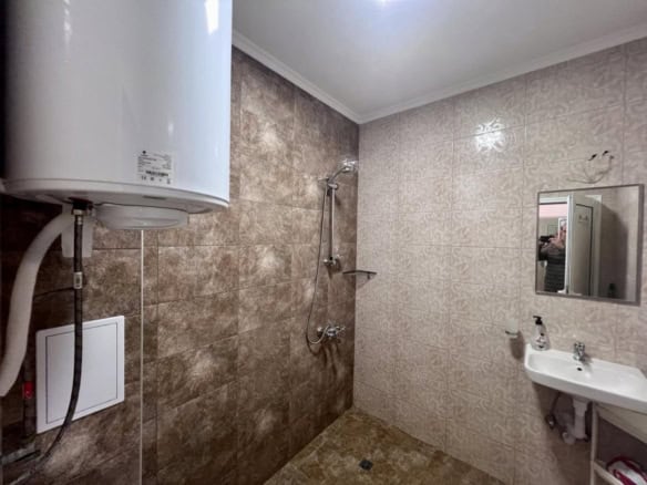 Modern studio bathroom with shower area in Magnolia Residence 5, Sunny Beach.