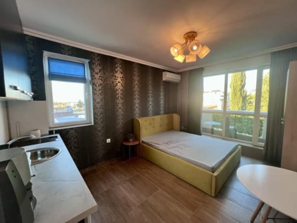 Bright studio apartment with balcony in Sunny Beach center, close to amenities and beaches.
