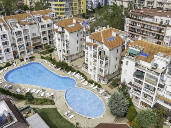 Modern apartment with pool view in Sunny Beach center, 75 sq.m., near beaches and amenities.