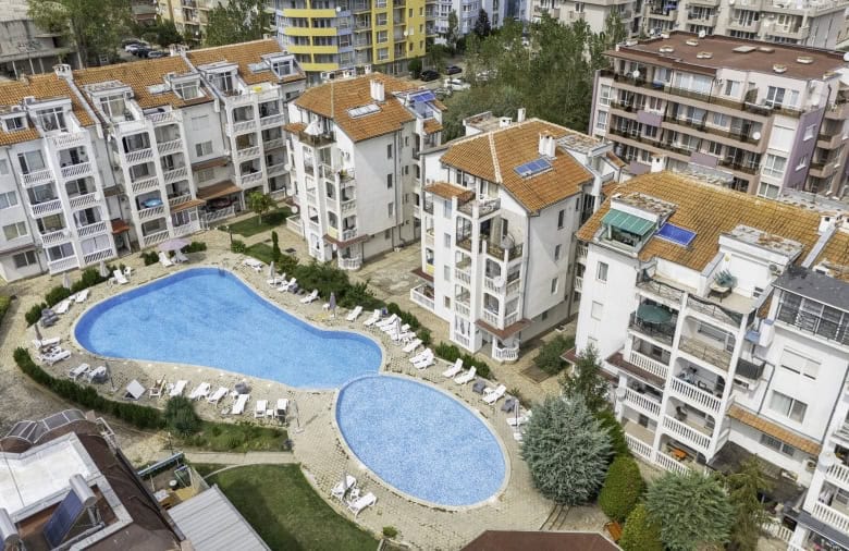 Modern apartment with pool view in Sunny Beach center, 75 sq.m., near beaches and amenities.