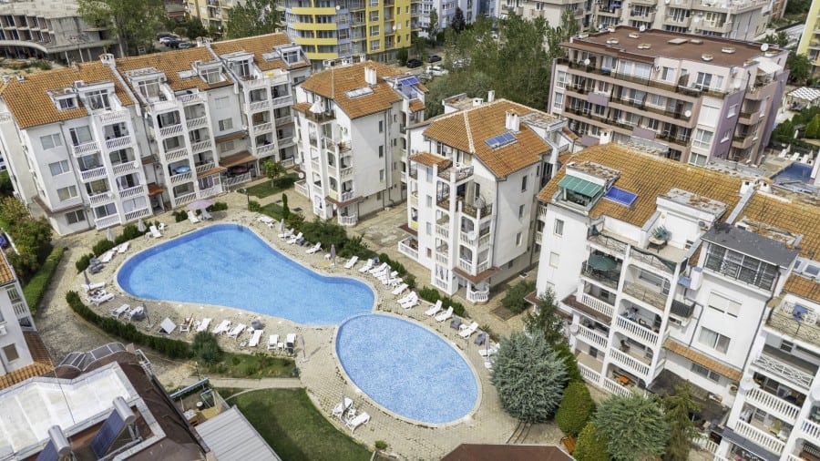 Modern apartment with pool view in Sunny Beach center, 75 sq.m., near beaches and amenities.