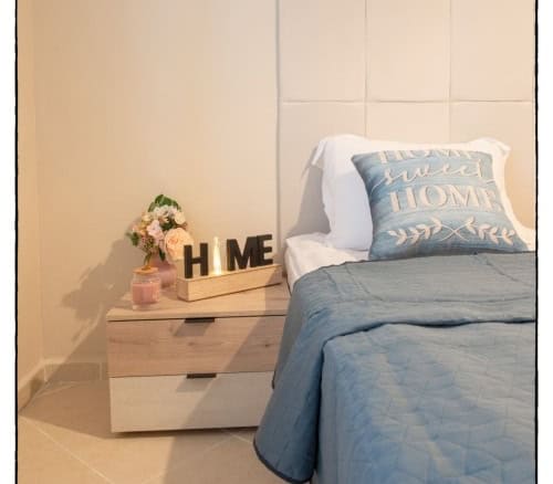 Modern 2-bedroom apartment in Sunny Beach with pool view, stylish decor, and central location.